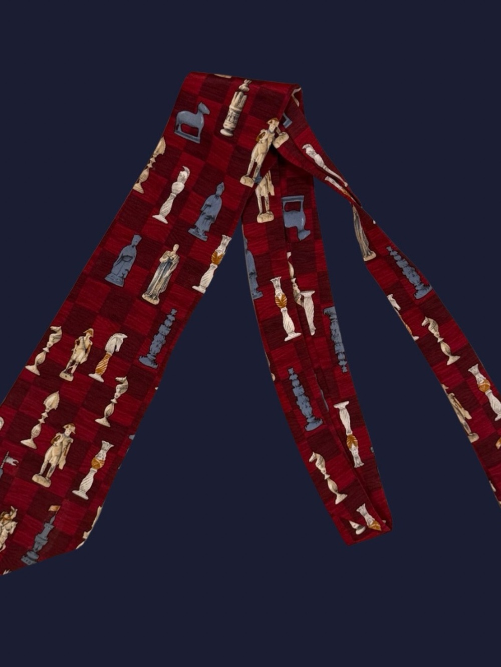 UNICEF Burgundy Chess Piece Tie from the United Nations Children’s Fund.